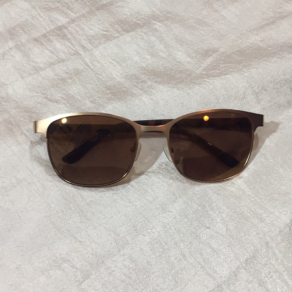 Bronzed sunglasses never worn